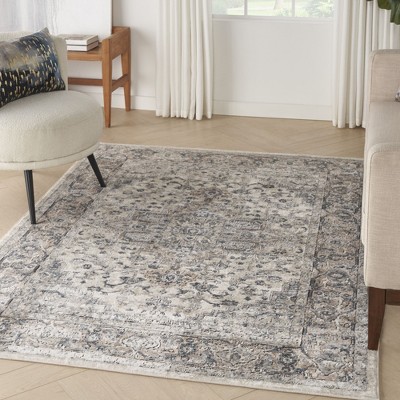 Ivory and Grey Synthetic 5' x 7' Reversible Area Rug