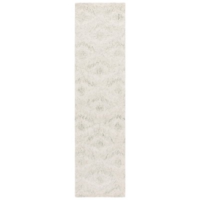 Ebony EBN921 Handmade Tufted Rug - Safavieh