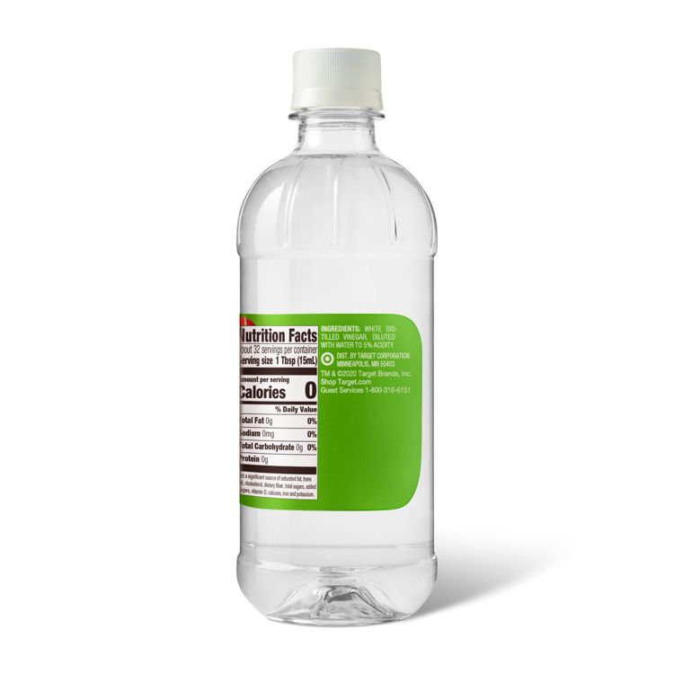 Clear plastic bottle with a white cap containing white distilled vinegar, showing a green label with nutrition facts and ingredients.