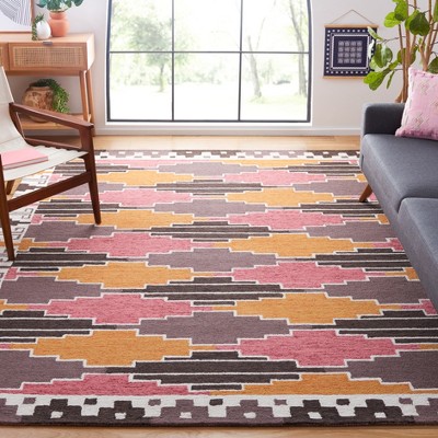 Rodeo Drive 6' x 9' Black and Rust Hand-Tufted Wool Area Rug