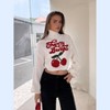 Women's Cropped Cherry Bomb Graphic Sweater - 2 of 4