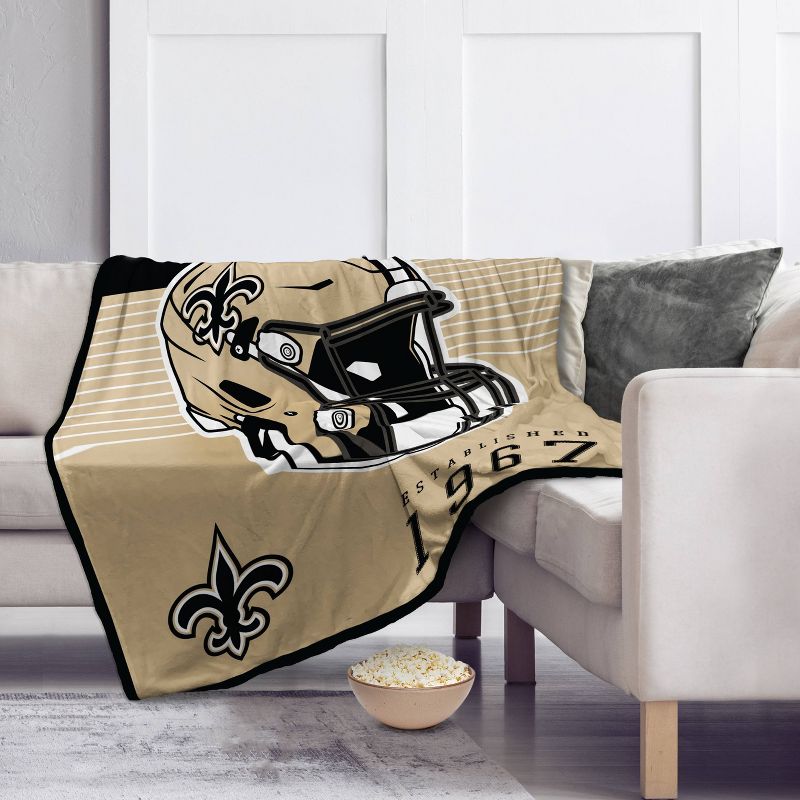 NFL New Orleans Saints Helmet Stripes Flannel Fleece Blanket, 2 of 4