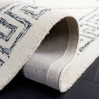Ivory and Black 5' x 8' Hand Tufted Wool Shag Rug