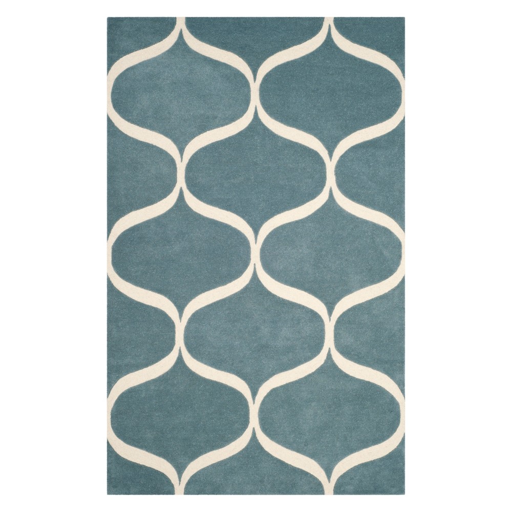 4'x6' Geometric Tufted Area Rug Light Blue/Ivory - Safavieh