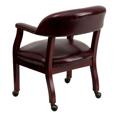 Elegant Oxblood Vinyl Conference Chair with Brass Nail Trim
