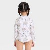 Toddler Girls' Disney Princess Long Sleeve Half Zip One Piece Rash Guard Swimsuit - Ivory - 2 of 3