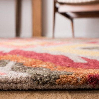 Handmade Red Ikat Wool Tufted Area Rug