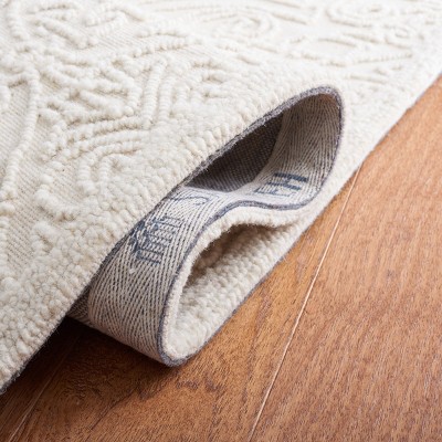 Ivory Hand-Tufted Wool and Synthetic 4' x 6' Area Rug