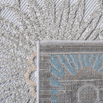 Beige and Blue Floral Synthetic Indoor/Outdoor Area Rug