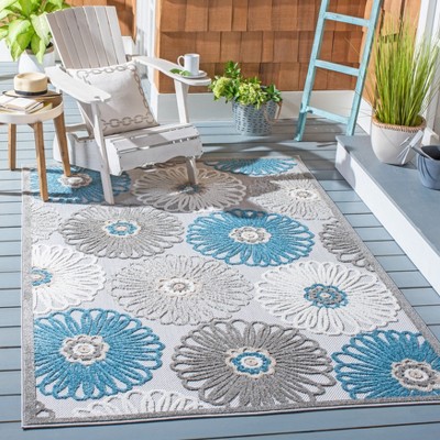 Beige and Blue Floral Synthetic Indoor/Outdoor Area Rug