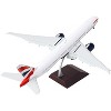 Boeing 777-300ER Commercial Aircraft w/Flaps Down White w/Striped Tail 1/200 Diecast Model Airplane by GeminiJets - 3 of 3