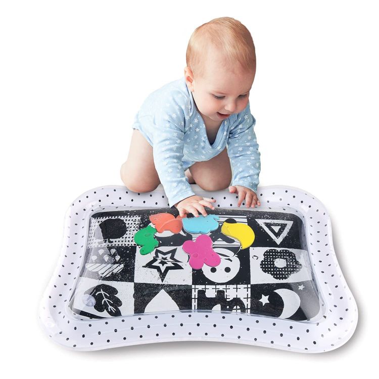 White and black polka dot playmat with colorful floating shapes inside, featuring a high-contrast pattern.
