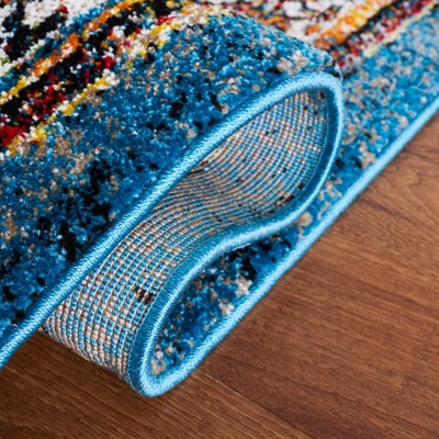 Vintage Blue and Black Synthetic Rectangular Area Rug 6'7" x 9'