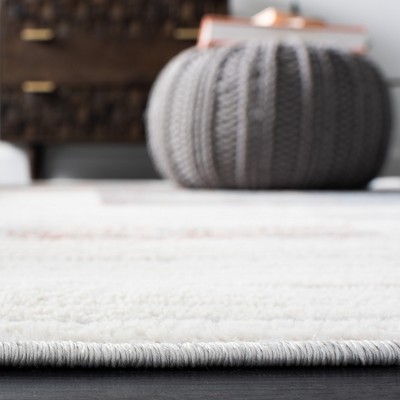 Elysian Ivory & Rust 93" Round Synthetic Area Rug