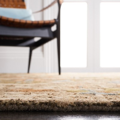 Handmade Blue Wool Tufted Floral Area Rug 5' x 8'
