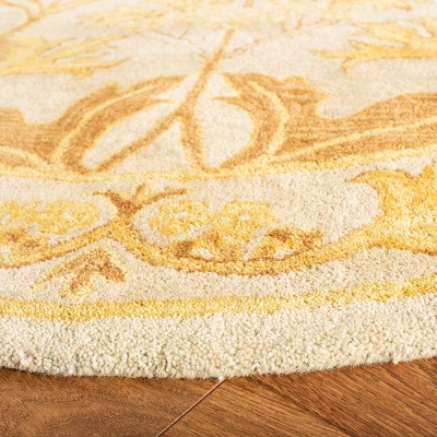 Hand-Tufted Beige and Gold Wool Round Area Rug, 6'