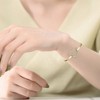 14K Gold-Plated Stacking Ring with Cubic Zirconia and a French Pave Heart Halo, offering a dazzling and elegant design for a refined look. - 2 of 3