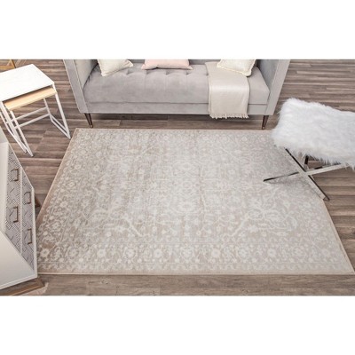 Ivory Synthetic 9' x 12' Stain-Resistant Rectangular Area Rug