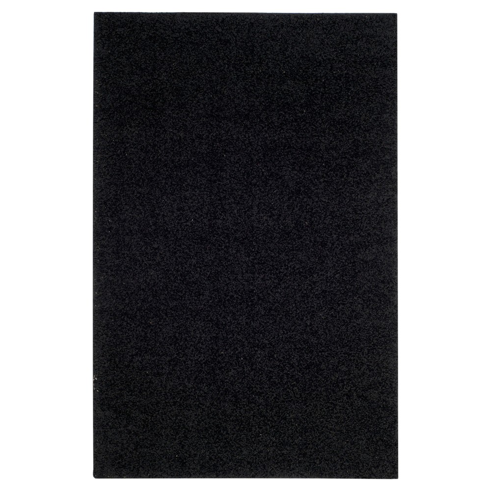 5'1inx7'6in Reedley Solid Loomed Area Rug Black - Safavieh