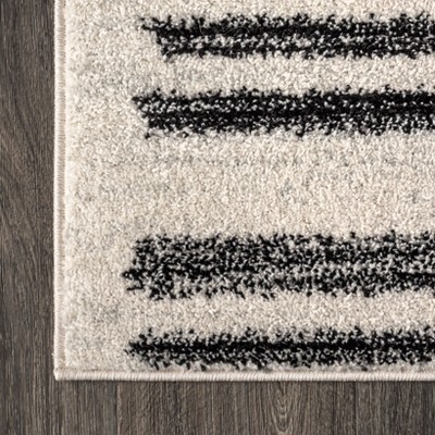Khalil 8' x 10' Black and Cream Synthetic Stripe Rug