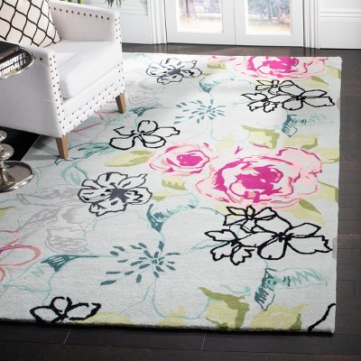 Blue and Multicolor Floral Wool 6' x 9' Handmade Rug