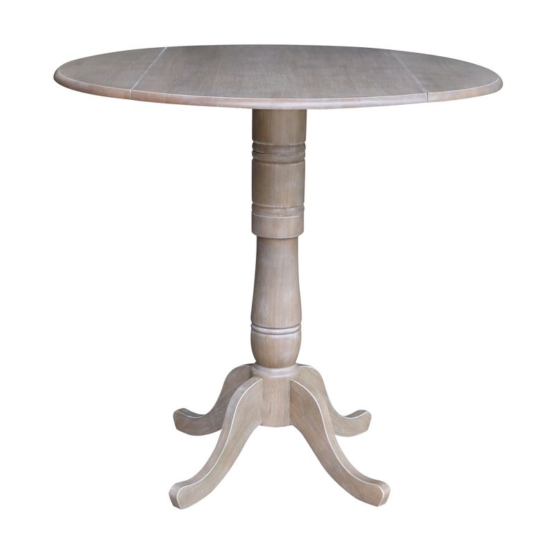 Nathaniel Round Dual Drop Leaf Pedestal Table Gray Taupe - International Concepts, 1 of 10