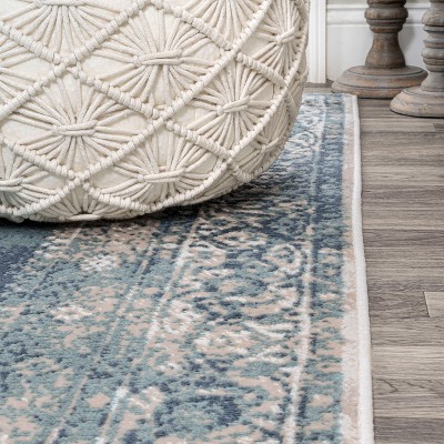 Ivory and Blue Medallion 8' x 10' Synthetic Area Rug