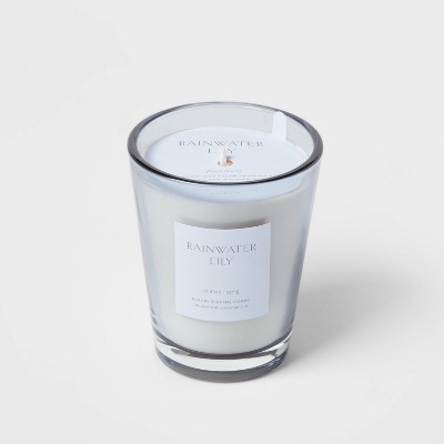 12.6oz Rainwater Lily & Peach Scented Candle with Glass Vase & Dustcover - Threshold™: Palm Wax, 52hr Burn Time