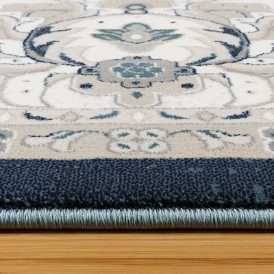 Moena Navy Blue and Ivory Synthetic Persian Area Rug