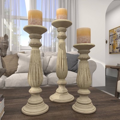 Elegant Mango Wood Teardrop Pillar Candlestick Trio, 18" Brown