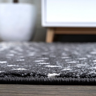 Antelope Abstract Black and Cream Synthetic 5x8 Area Rug