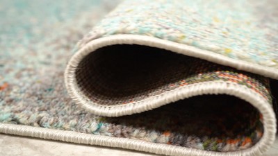 Cream and Turquoise Abstract Synthetic Area Rug