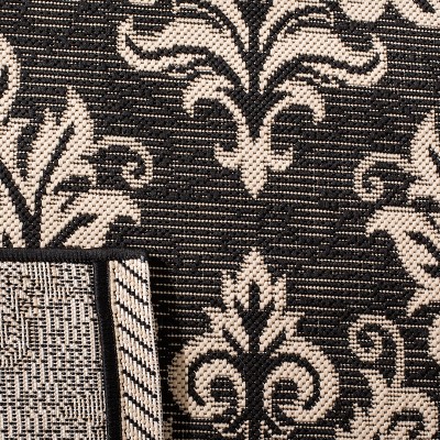 Black and Cream Rectangular Synthetic Indoor/Outdoor Rug
