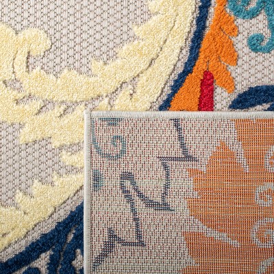 Ivory and Blue Floral Synthetic Indoor/Outdoor Rug