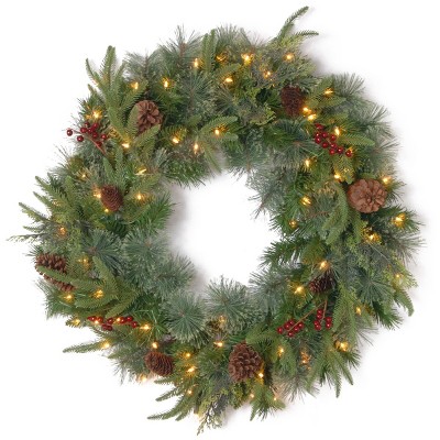 Photo 1 of 24" Prelit Colonial Fir Christmas Wreath with Pinecones and Berries White Lights - National Tree Company