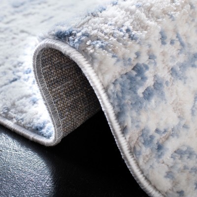 Amelia Ivory and Blue Abstract 3' x 5' Synthetic Area Rug