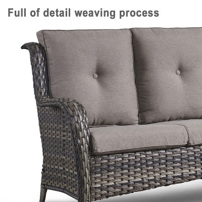Close-up of woven arm of outdoor sofa with cushion back