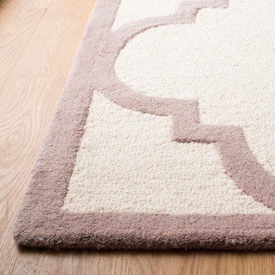 Hand-Tufted Beige/Ivory Wool 6' x 9' Area Rug