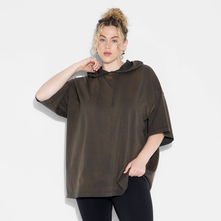 Brown colored oversize t-shirt with short sleeves and a hood.