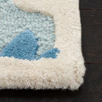 Hand-Tufted Elegance Blue & Ivory Wool Area Rug, 4' x 6'