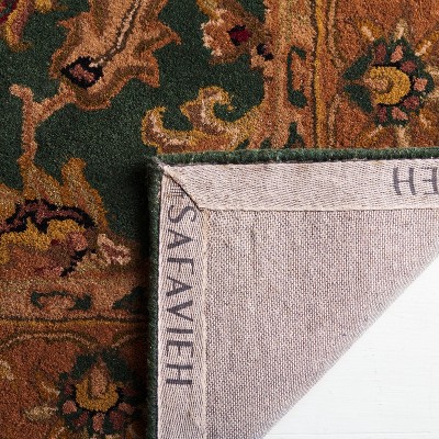 Handmade Oval Tufted Red Wool Rug 4' x 6'