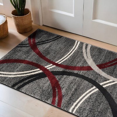 5' x 7' Red and Gray Abstract Synthetic Area Rug