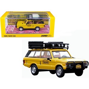 Land Rover Range Rover Classic "Camel Trophy 1982" Yellow w/Roof Rack and Accessories 1/64 Diecast Model Car by Inno Models - 1 of 3
