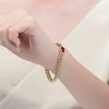 14K Yellow Gold Curb Chain Bracelet featuring a Colored Cubic Zirconia Halo Cluster, combining rich color and sparkling elegance for a stunning look - 3 of 3