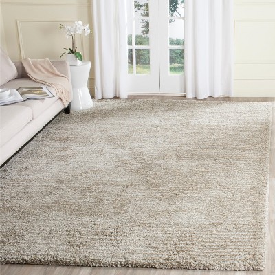 Ivory 8' x 10' Handmade Tufted Shag Rug