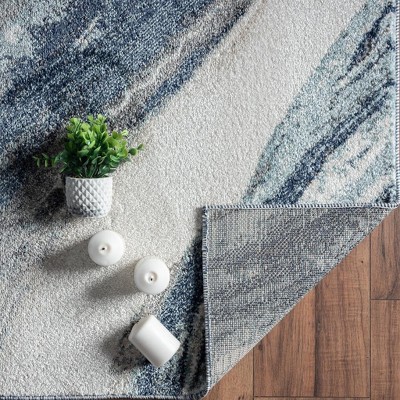 Blue and White Abstract 8' x 10' Synthetic Area Rug