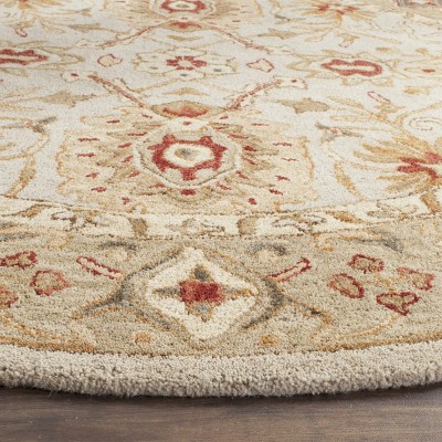 Elegant Heirloom Gray Wool 54" Oval Hand-Tufted Area Rug