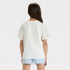 Girls' Short Sleeve Oversized Cali Graphic T-Shirt - Cat & Jack™ Cream - 3 of 4