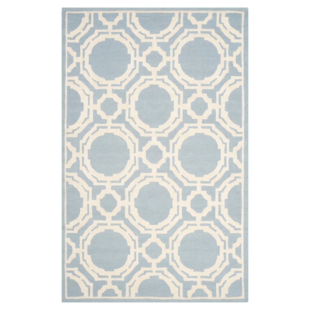 5'x8' Claudia Area Rug Blue / Ivory - Safavieh