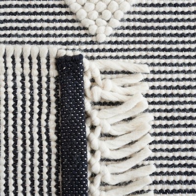 Marbella Black and Ivory Flat Woven Wool Area Rug
